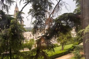a view of the city from the park at Apartamento Enfrente Palacio Royal Palace I in Madrid
