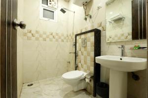 Koupelna v ubytování Airport Hotel Roomsity Pride