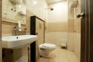 Koupelna v ubytování Airport Hotel Roomsity Pride
