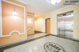 Certyfikat, podpis lub inny dokument wystawiony w obiekcie Baltic Apartments - Apartamenty Korony Piastów