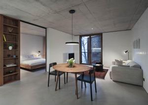 Ένα ή περισσότερα κρεβάτια σε δωμάτιο στο DOT Sofia Apart Hotel