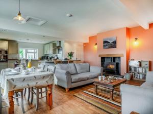 a living room with a couch and a table at 2 bed in Builth Wells BN059 in Garth