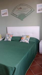 Säng eller sängar i ett rum på Villa Milena