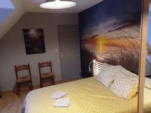 Postel nebo postele na pokoji v ubytování Chambres d'Hôtes Les Mésanges