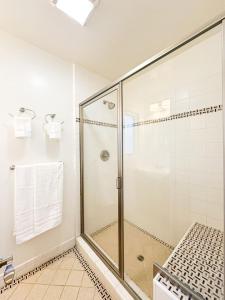 a shower in a bathroom with a glass shower stall at 4 BR House With Pool - BB-WW in Los Angeles