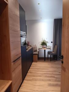 Eldhús eða eldhúskrókur á Feiserhof Navis - Appartements