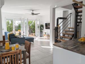 a living room with a couch and a table at Vila Burin in Tribunj