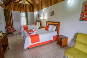 Postel nebo postele na pokoji v ubytování Hotel Campo Verde