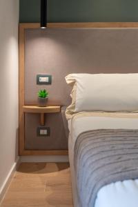 Posteľ alebo postele v izbe v ubytovaní B&B Amadema