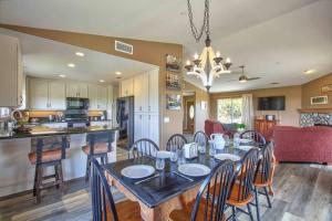 a dining room and kitchen with a table and chairs at Fallbrook, CA. Entire house. “Hilltop comforts”. in Fallbrook
