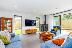 TV a/nebo společenská místnost v ubytování Elegant, Executive Retreat