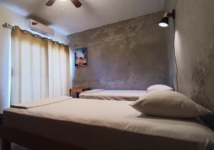 Postel nebo postele na pokoji v ubytování Bermejo Hostel