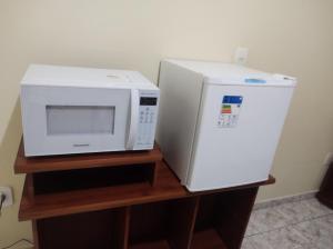 Bilde i galleriet til QUARTO CONFORTAVEL COM GARAGEM i Holambra