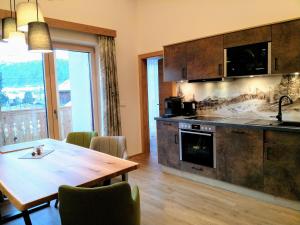 Kuchyňa alebo kuchynka v ubytovaní Apartments Haufhof , Haus im Ennstal bei Schladming