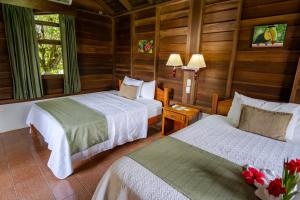 Postel nebo postele na pokoji v ubytování Hotel Campo Verde
