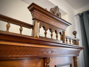 a close up of a wooden stair case at Zentrum Vintage Appartments in Braşov