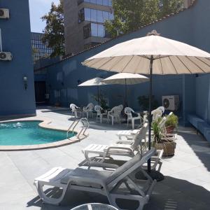 Bazén v ubytování Hotel Alcala del Rio nebo v jeho okolí