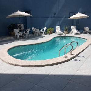 Bazén v ubytování Hotel Alcala del Rio nebo v jeho okolí