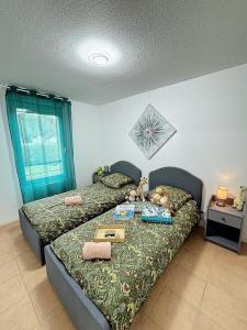 Postel nebo postele na pokoji v ubytování Villa de Castelli - résidence avec piscine