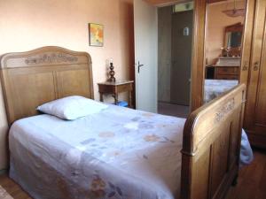 Postel nebo postele na pokoji v ubytování Séjour au Naturel chez l'habitant