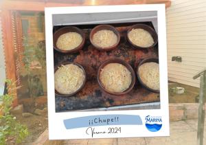 ビーニャデルマールにあるAlojamientos Marinaのオーブンのグリルに盛られたご飯4杯 +8枚の写真