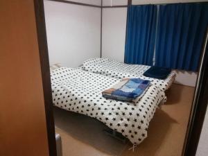Postel nebo postele na pokoji v ubytování Corpo Marika 0 - Vacation STAY 43292v