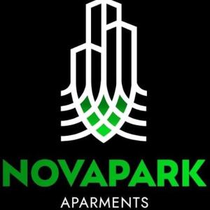 a green and white logo with the words nowar amendments at NOVAPARK HOTEL in Guayaquil