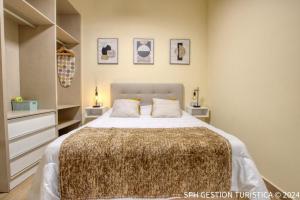 En eller flere senge i et værelse på Igor Home centro de Murcia