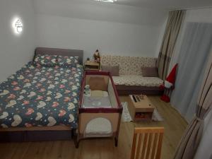Postel nebo postele na pokoji v ubytování Apartman SANJALICA Divčibare
