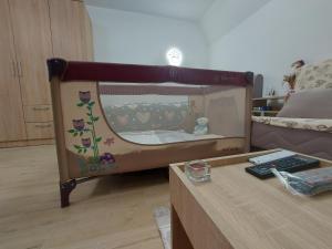 Postel nebo postele na pokoji v ubytování Apartman SANJALICA Divčibare