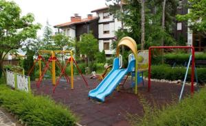 a playground with a slide in a park at Sea Bliss Retreat -Santa Marina - Sozopol in Sozopol