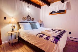 Katil atau katil-katil dalam bilik di Wanderlust Mountain Side Chalet