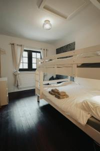 Llit o llits en una habitació de L'Ecluse Simon