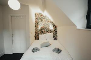 Llit o llits en una habitació de L'Ecluse Simon