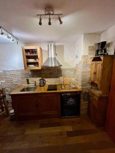 a kitchen with a sink and a stove at stylish apartment Old Town free parking in Heidelberg