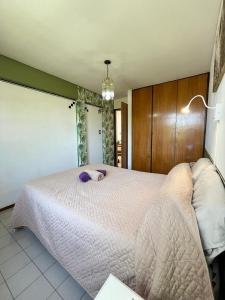 Un pat sau paturi într-o cameră la Departamento en Mendoza parque central -Mijo-