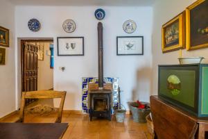 TV a/nebo společenská místnost v ubytování XPCE Casería San José