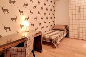 Postel nebo postele na pokoji v ubytování Comfortable apartment near the ski station with parking