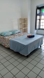 a large bed in a room with at Hostel Salvador Meu Amor in Salvador