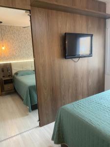 Ένα ή περισσότερα κρεβάτια σε δωμάτιο στο APTO PRIME 2 DORM COM GARAGEM À 2,9km DA FENAC +21 φωτογραφίες
