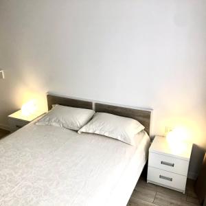 Posteľ alebo postele v izbe v ubytovaní OSapart Beautiful apartment in a complex Semycvit