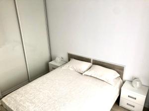 Posteľ alebo postele v izbe v ubytovaní OSapart Beautiful apartment in a complex Semycvit