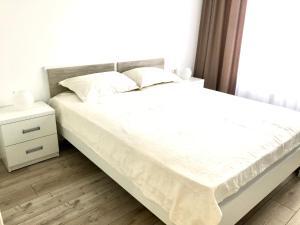 Posteľ alebo postele v izbe v ubytovaní OSapart Beautiful apartment in a complex Semycvit