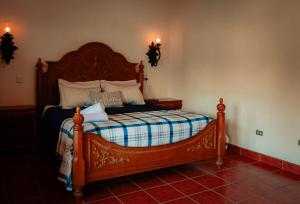 Tempat tidur dalam kamar di Palacio del conquistador