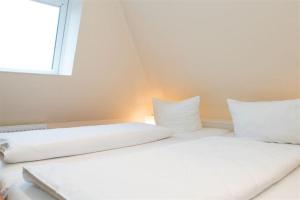 Ένα ή περισσότερα κρεβάτια σε δωμάτιο στο Haus-Fili