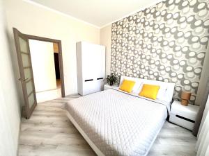 Posteľ alebo postele v izbe v ubytovaní OSapart Beautiful apartment in a complex Semycvit