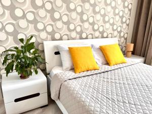 Posteľ alebo postele v izbe v ubytovaní OSapart Beautiful apartment in a complex Semycvit
