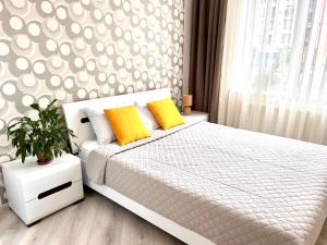 Posteľ alebo postele v izbe v ubytovaní OSapart Beautiful apartment in a complex Semycvit