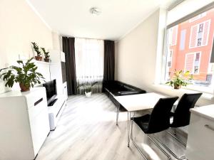 Posedenie v ubytovaní OSapart Beautiful apartment in a complex Semycvit