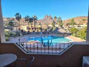 a view of a swimming pool in a resort at Departamento Marinaterra in San Carlos